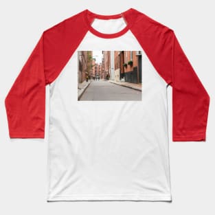 Boston back street background image with focus on foreground and blurry urban beyond, USA. Baseball T-Shirt